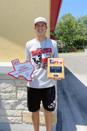 St. Paul Class of 2023 member Trent Brown displays two awards he won recently: The TXPS Podcast TAPPS D4 2022 Defensive Back of the Year and the TAPPS 2022-23 2A Male Athlete of the Year. Photo courtesy of Nicco Brown. 