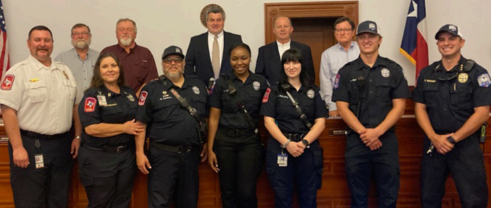 At Monday’s Lavaca County Commissioners’ Court meeting, the court declared the week of May 19-25 as Emergency Medical Services Week. Members of the Lavaca County EMS team were present for the meeting front from left are Lavaca County EMS chief Michael A. Furrh, Captain Melissa Leopold, FTO Steve Garcia, AEMT Aiyanna Adams, Paramedic Abby Pulatie, EMT Austin Kutac and Assistant chief Tim Decker. 