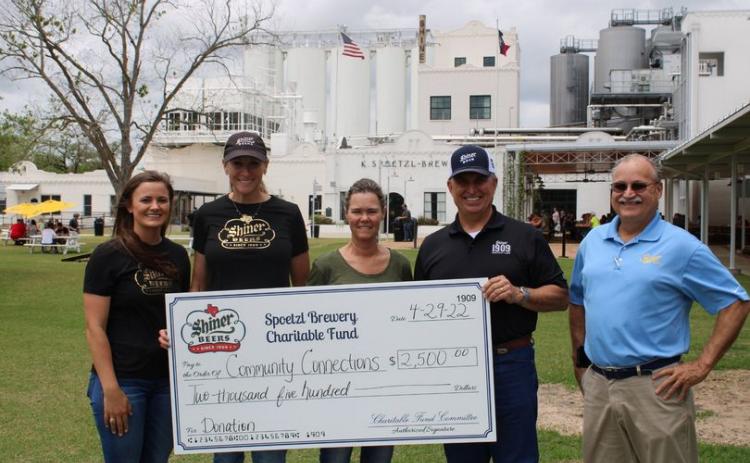 Becky Janak, Program Manager of CCLC (center), accepted the donation and is pictured with brewery team members Lauren Schuette, Julie Boehm, Tom Fiorenzi and Jimmy Mauric.