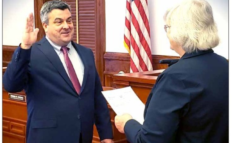 Image at the top of Hallettsville's Jan. 4 front page: Keith Mudd accepts his oath of office on Jan. 1.
